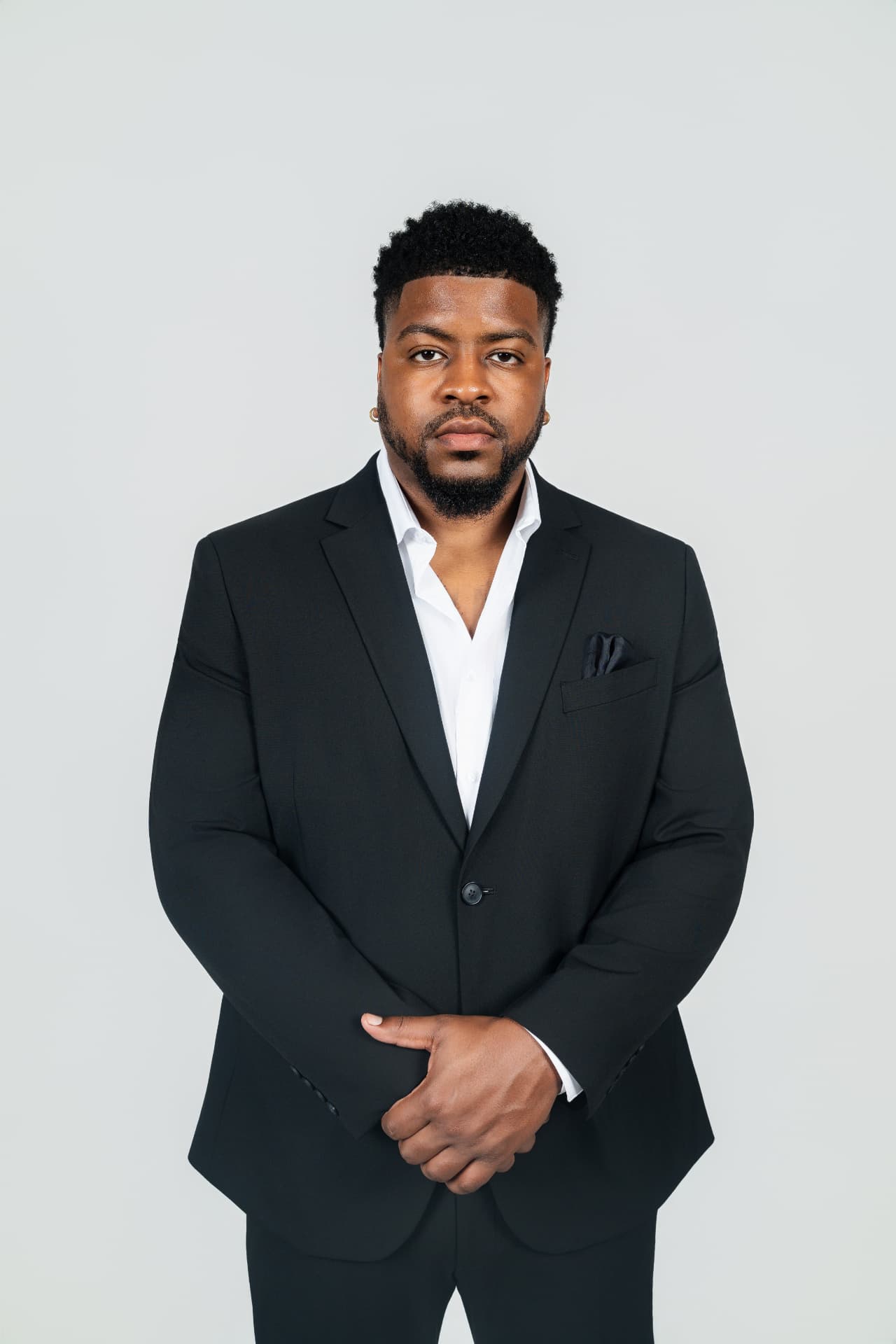 Full-body portrait of DJ DMC — Darryl McDaniel, professional wedding and event DJ serving Washington DC, Maryland, and Virginia