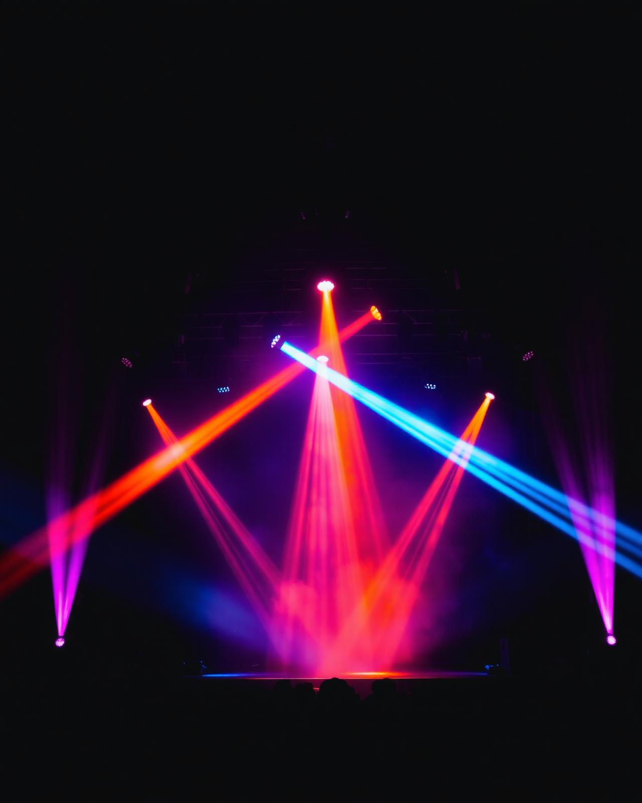 Beautiful event lighting beams at a formal celebration